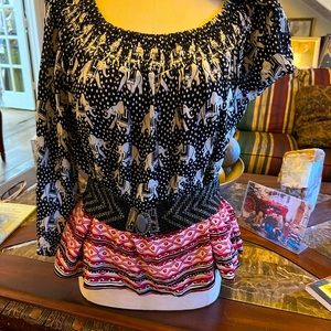 Baby doll blouse. Loose fit. Belt not included. Nice